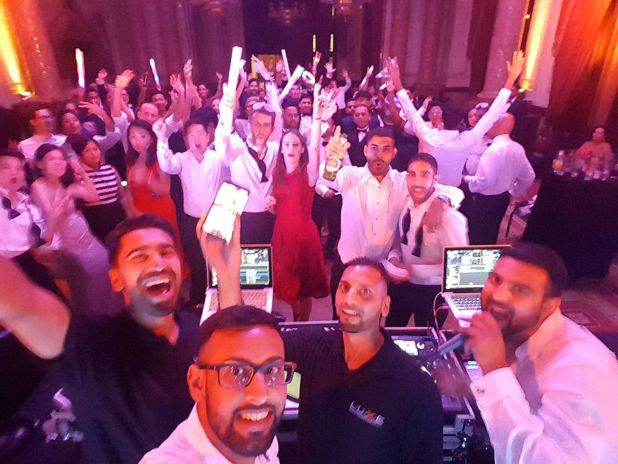 Asian DJs at party