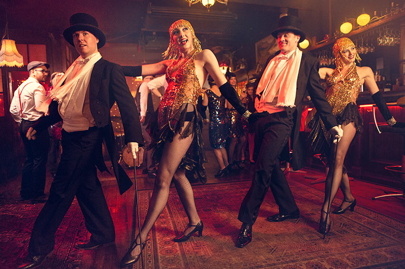 male and female gatsby dancers