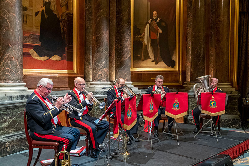 Military brass band performing at an event