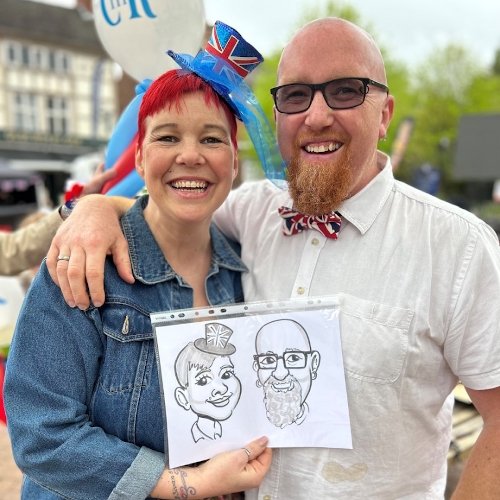 smiling couple with caricature