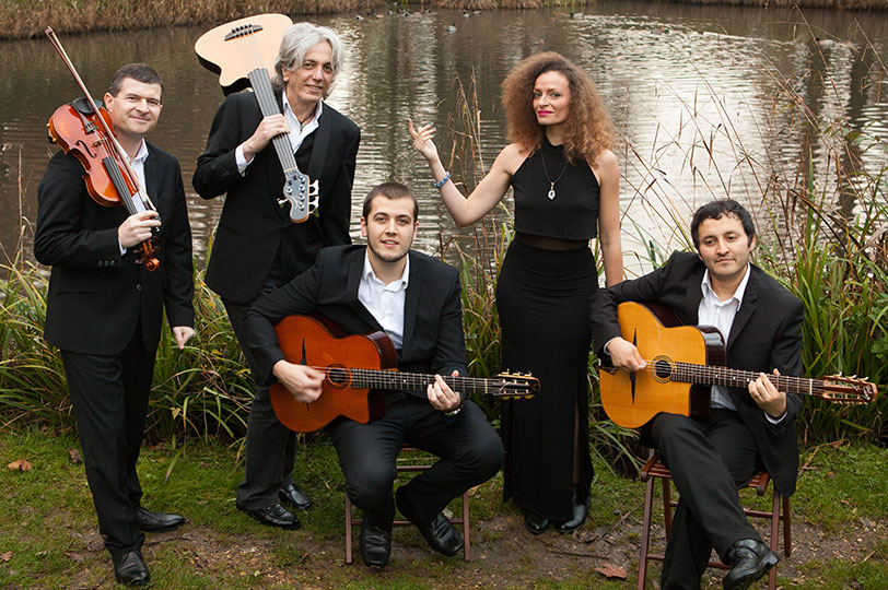Gypsy swing band standing together