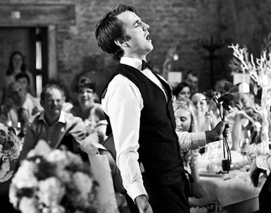 singing waiter performing at wedding